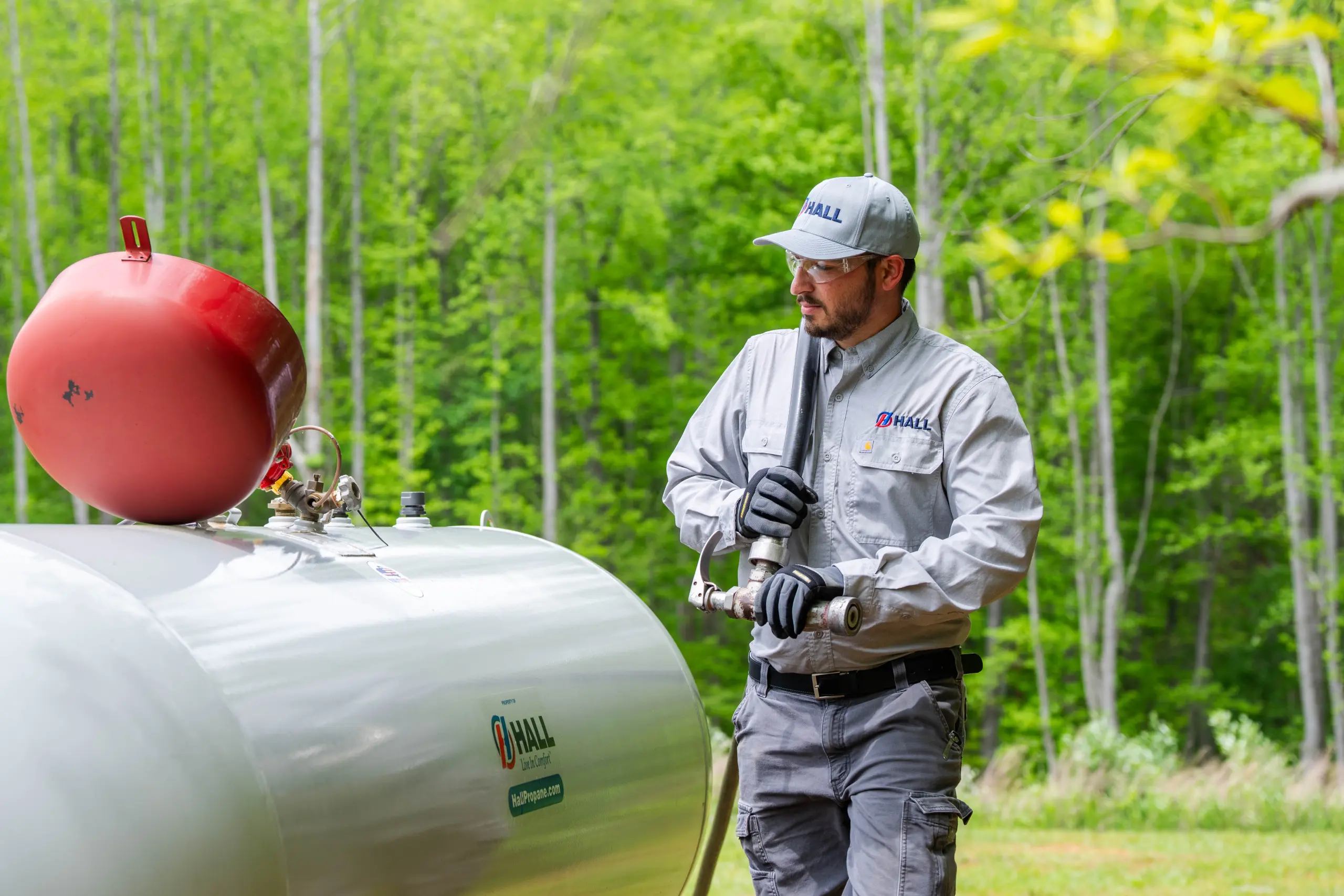 Propane service tech making a delivery